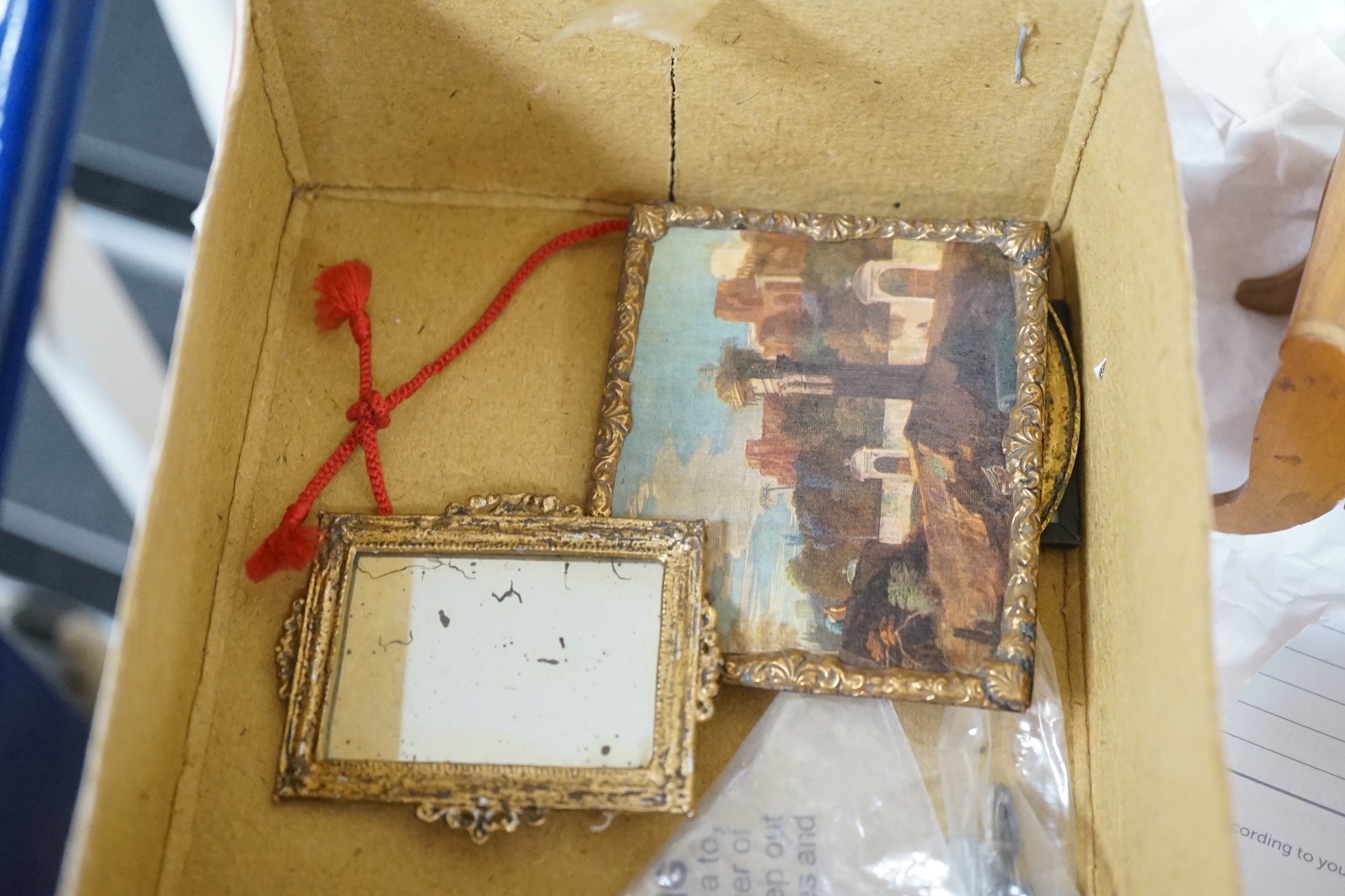 An early 19th century painted doll's house with block work facade enclosing a four room interior with central staircase, to be sold with assorted later furniture and accessories, width 117cm, depth 48cm, height with asso